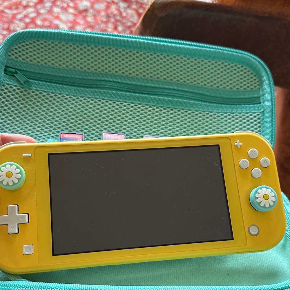 Yellow Handheld Nintendo Switch w/  added flower buttons, carrying case, charger